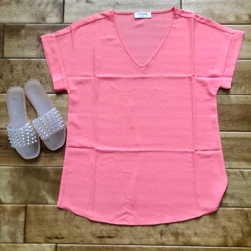 Coral V Neck w/ rolled sleeve.